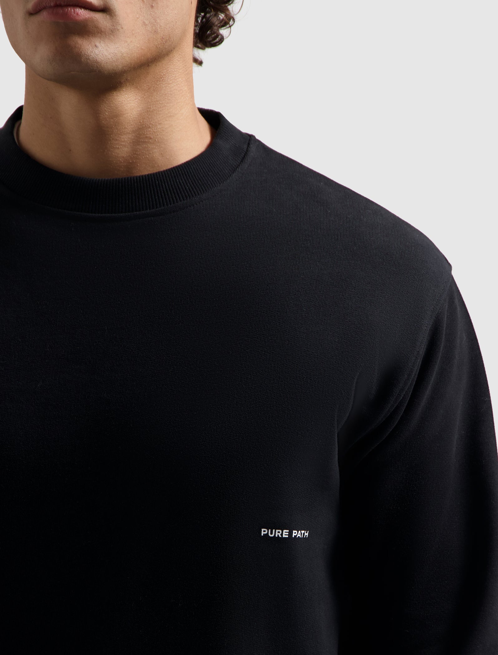 Essential Sideline Wordmark Sweater | Black